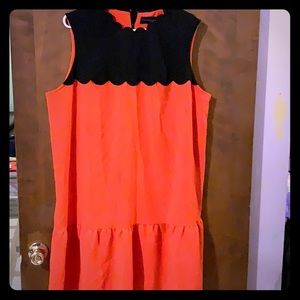 A cute victoria Beckham dress color orange